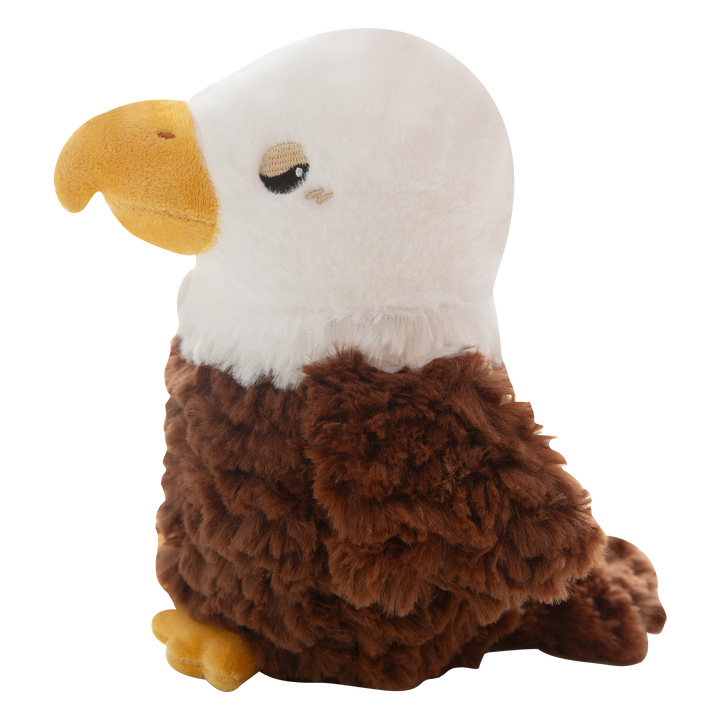 Evan the Eagle by Snugarooz is a plush dog toy featuring a white head, yellow beak and feet, brown fuzzy body, and small black eyes, shown on a plain white background.
