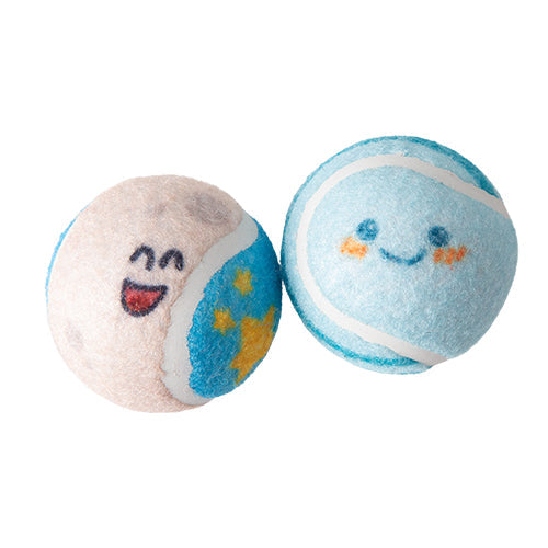 Two tennis balls with cartoon faces drawn on them, one primarily white and the other with a blue and yellow design, both featuring smiley faces.